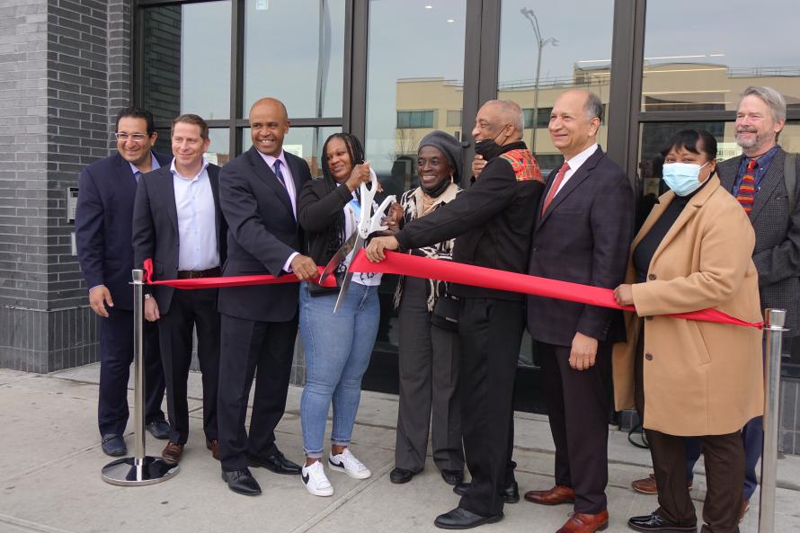 HDC and HPD representative with Project Partners cutting the ribbon at Linden Terrace in Brooklyn