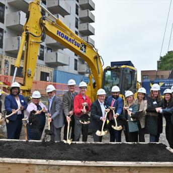 picture of people with shovels at the Coney Landing groundbreaking